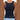 Back view of Colorful Standard Women's Organic Rib Tank Top in Navy Blue, showcasing its fitted design and ribbed texture.
